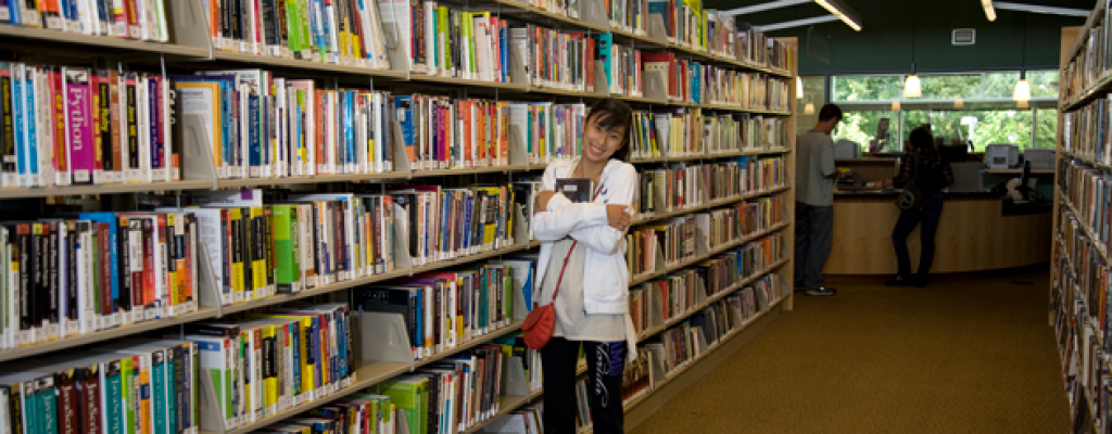 Woman Hugging Books