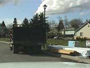 Construction materials stored on the sidewalk and street