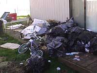 Garbage piled in the yard amongst toys also attracts pests