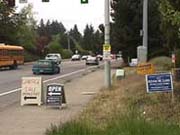 Signs obstructing the sidewalk