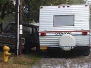 Trailer parked on street, not adjacent to owner's property