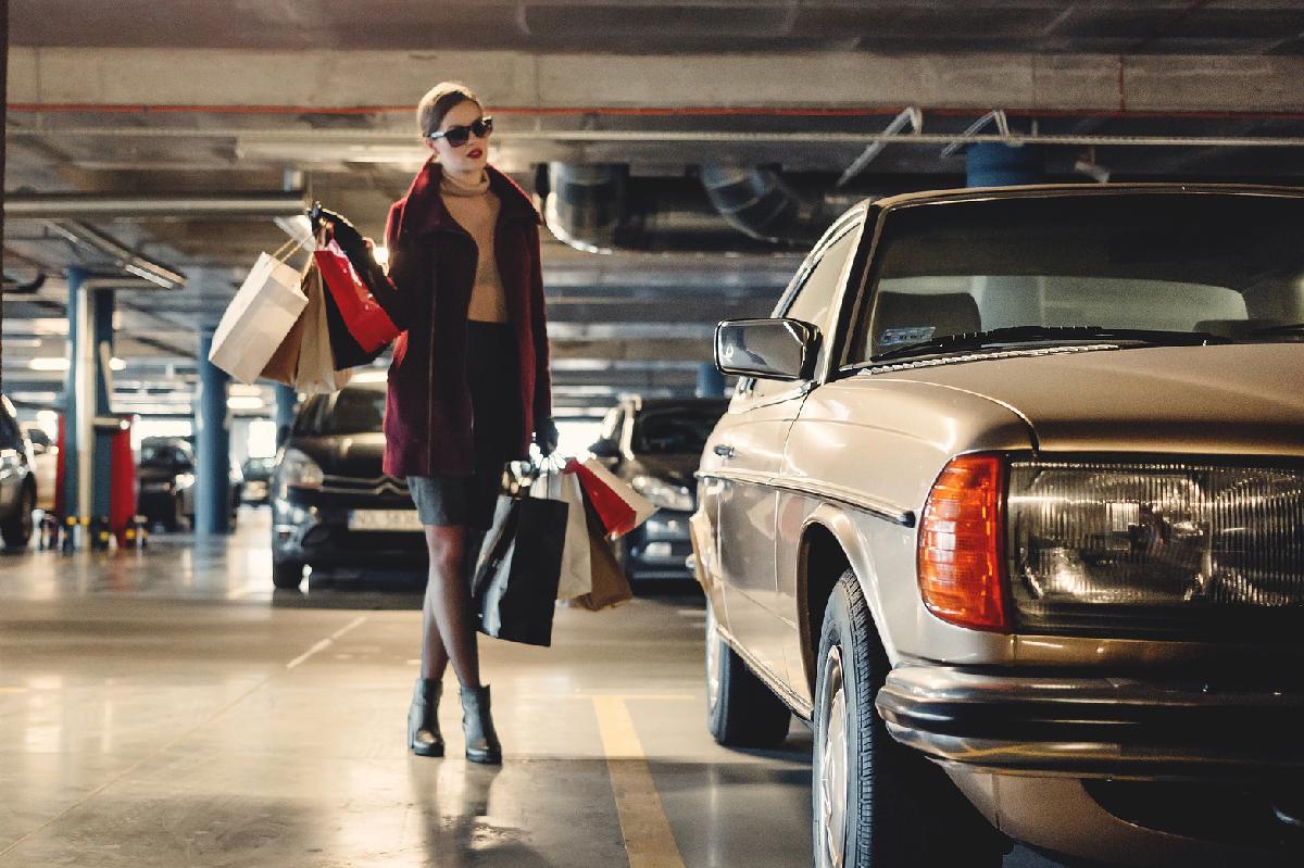 shopper walking to car in parking garage