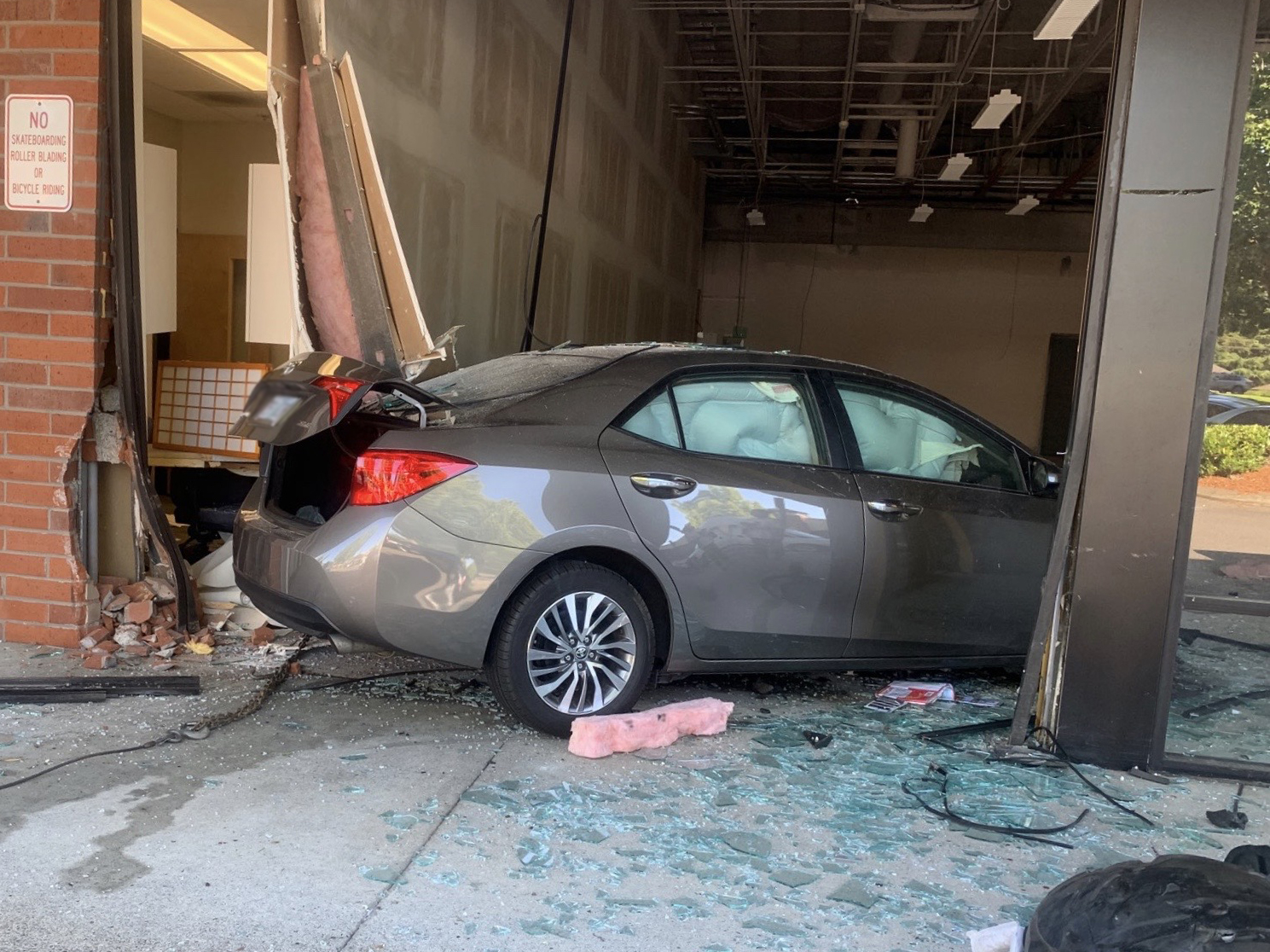 car crashed into business